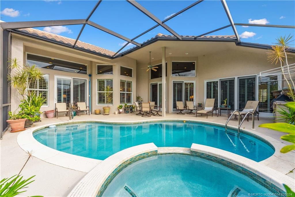 Photo of 1401 NW Winters Creek Road, Palm City, FL 34990 (MLS # M20043314)