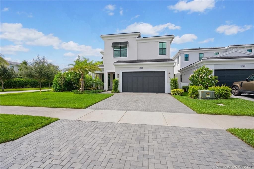Photo of 13662 Artisan Circle, Palm Beach Gardens, FL 33418 (MLS # M20045899)