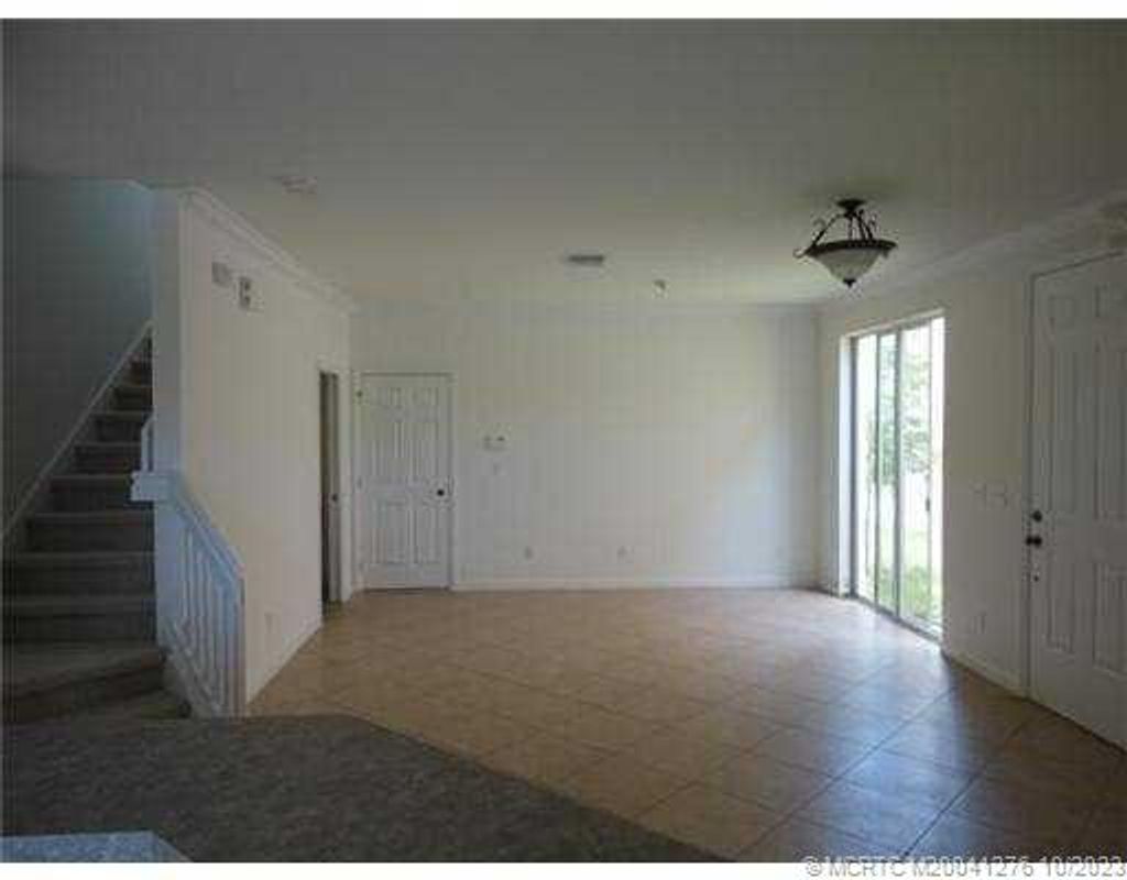 Photo of 2401 SE ruskin Drive, Port Saint Lucie, FL 34951 (MLS # M20041276)