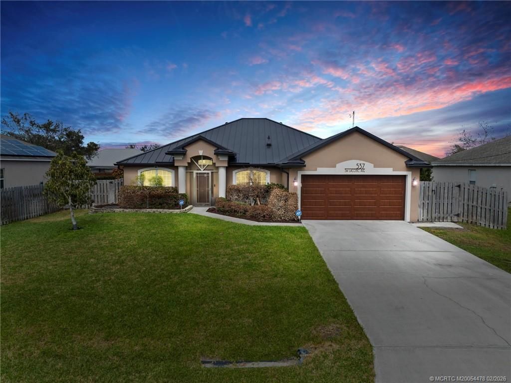 Photo of 537 SW Laconic Avenue SW, Port Saint Lucie, FL 34953 (MLS # M20054478)