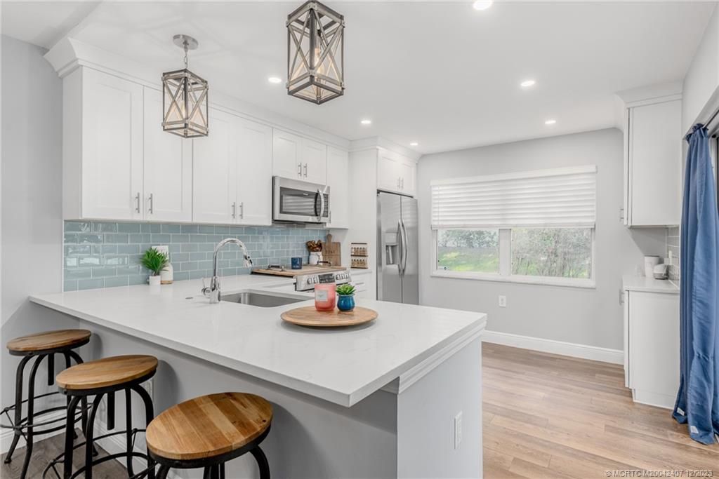 Photo of 3241 SW Sunset Trace Circle, Palm City, FL 34990 (MLS # M20042407)