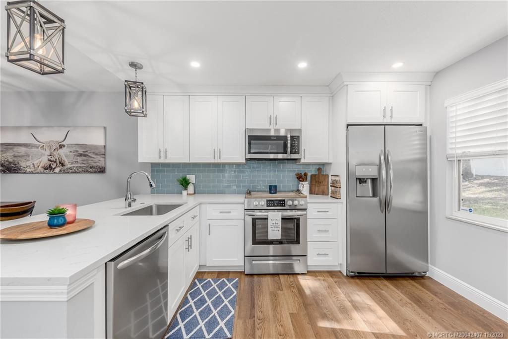 Photo of 3241 SW Sunset Trace Circle, Palm City, FL 34990 (MLS # M20042407)