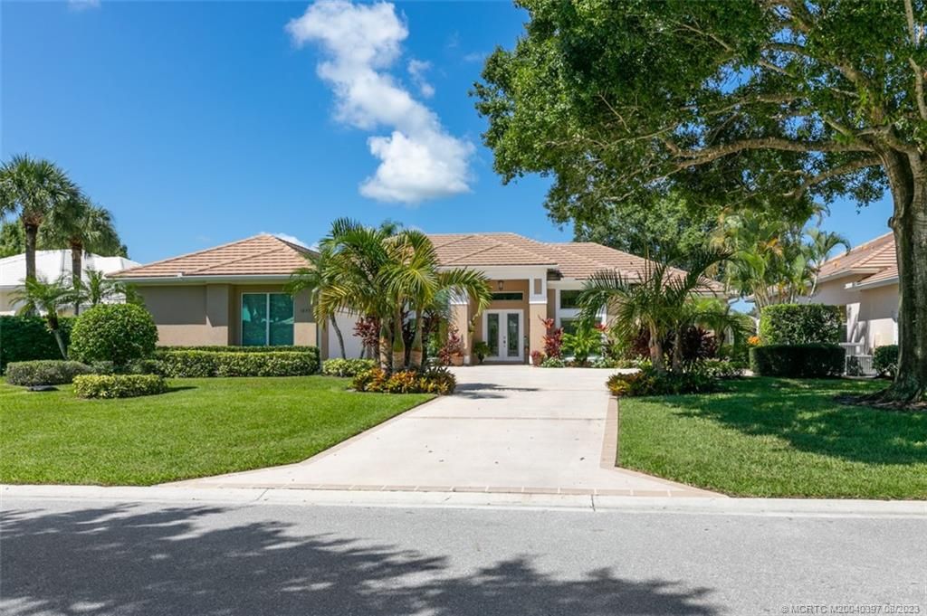 Photo of 1835 SW Foxpoint Trail, Palm City, FL 34990 (MLS # M20040397)