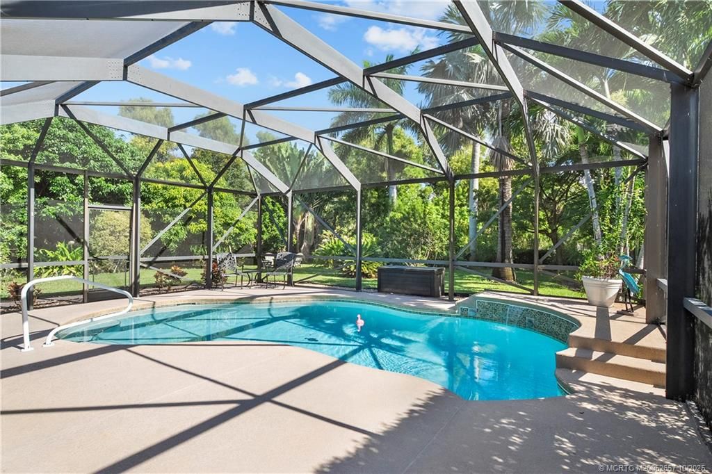 Photo of 691 NW Red Pine Way, Jensen Beach, FL 34957 (MLS # M20052657)