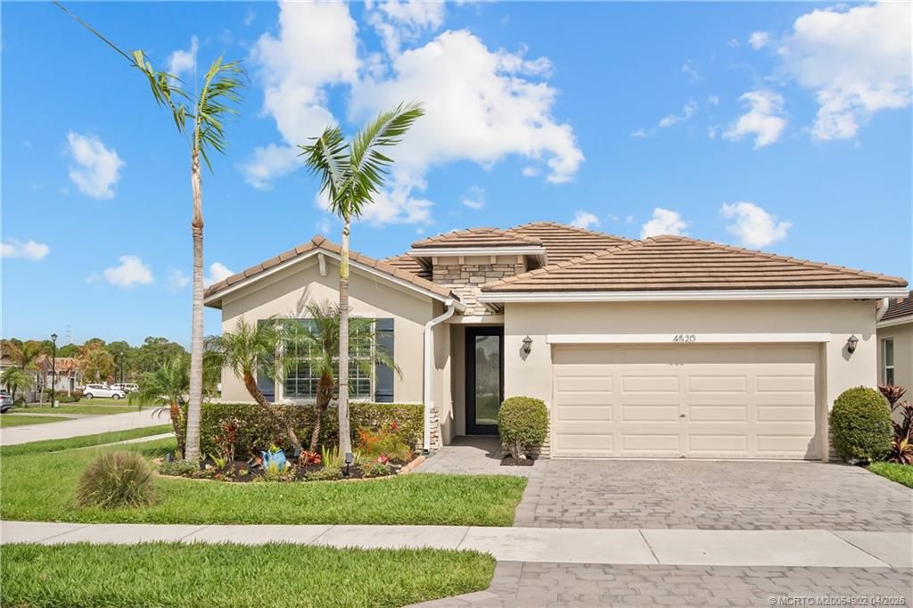 Photo of 4520 NW Exchange Avenue, Jensen Beach, FL 34957 (MLS # M20054902)
