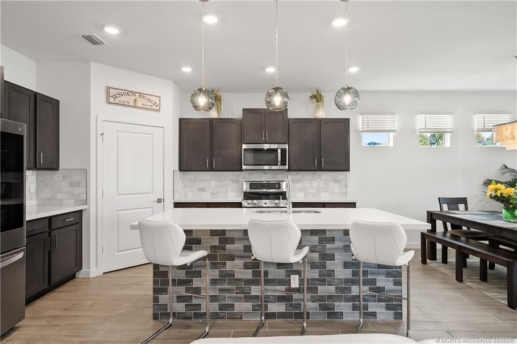 Photo of 4520 NW Exchange Avenue, Jensen Beach, FL 34957 (MLS # M20054902)