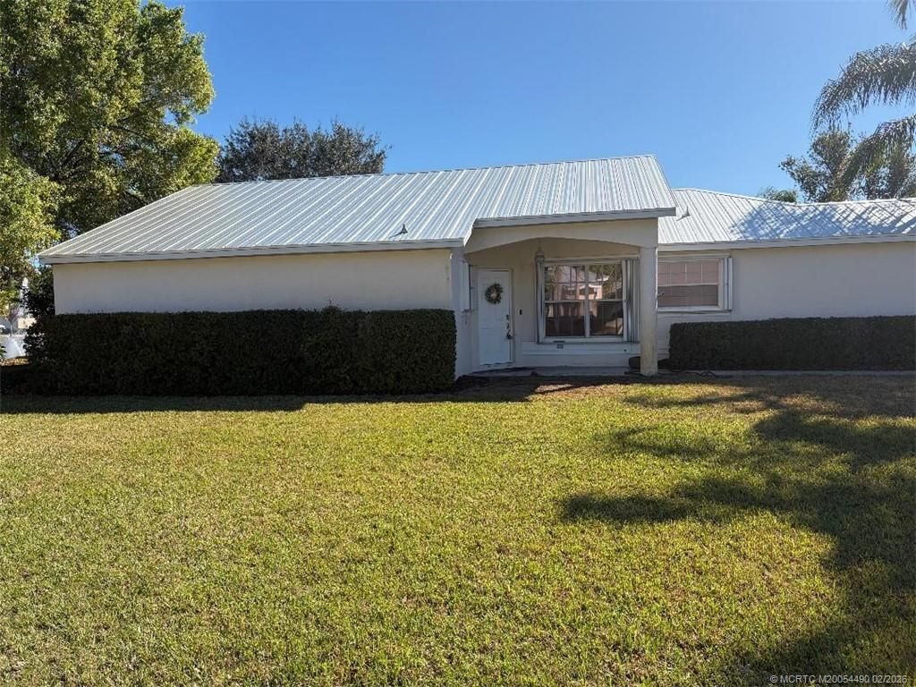 Photo of 3486 SW Pindo Palm Lane, Palm City, FL 34990 (MLS # M20054490)