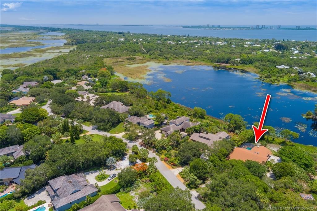 Photo of 3881 NE Sugarhill Avenue, Jensen Beach, FL 34957 (MLS # M20039891)