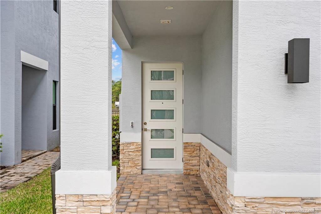 Photo of 3660 SW Magnolia Ridge Lane, Palm City, FL 34990 (MLS # M20055056)