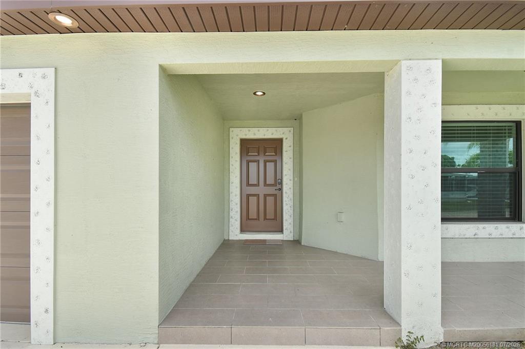 Photo of 10 Kassaba Lane, Port Saint Lucie, FL 34952 (MLS # M20056181)