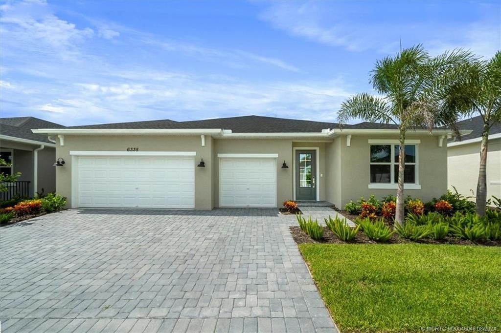 Photo of 6335 NW Sweetwood Drive, Port Saint Lucie, FL 34981 (MLS # M20046048)