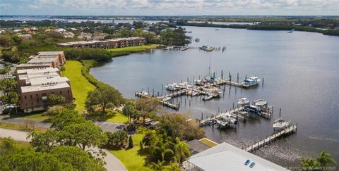 Photo of 3100 SE Pruitt Road #H104, Port Saint Lucie, FL 34952 (MLS # M20054980)