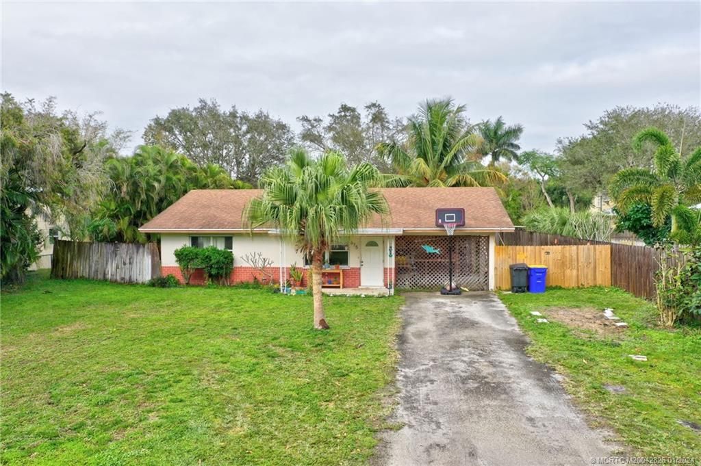 Photo of 675 SW 34th Terrace, Palm City, FL 34990 (MLS # M20042826)