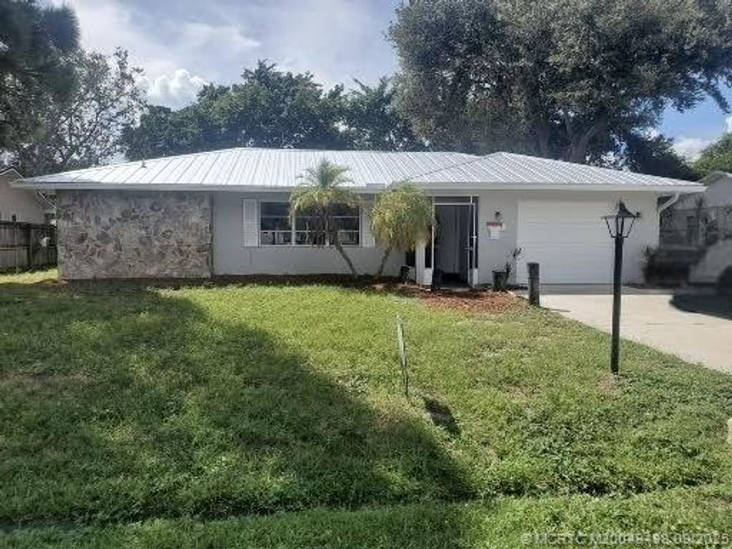 Photo of 1526 SE Minorca Avenue, Port Saint Lucie, FL 34952 (MLS # M20049498)