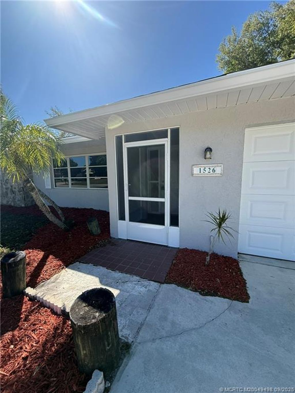 Photo of 1526 SE Minorca Avenue, Port Saint Lucie, FL 34952 (MLS # M20049498)