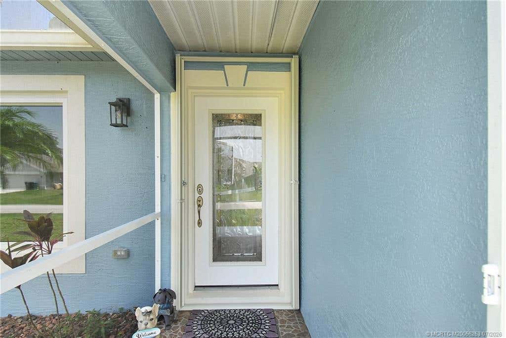 Photo of 4499 SW Jaunt Road, Port Saint Lucie, FL 34953 (MLS # M20056253)
