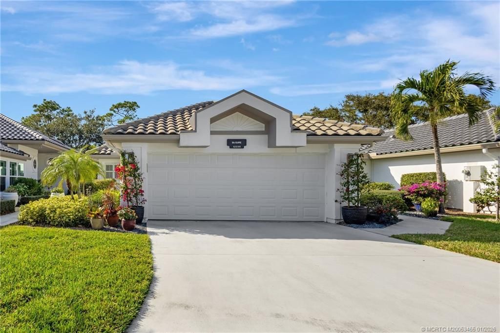 Photo of 12336 Harbour Ridge Boulevard, Palm City, FL 34990 (MLS # M20053465)