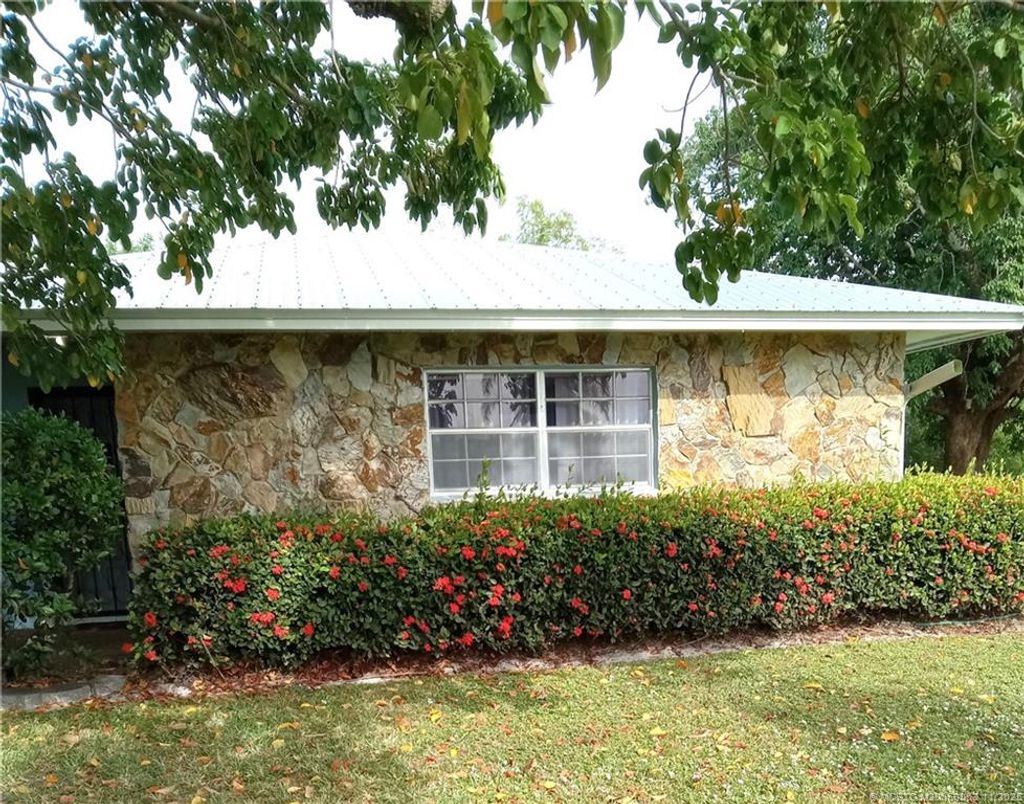 Photo of 477 SW Seabreeze Lane, Port Saint Lucie, FL 34983 (MLS # M20053053)