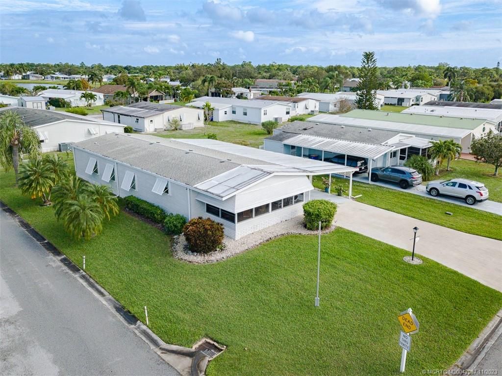 Photo of 2599 SW Marquis Terrace, Stuart, FL 34997 (MLS # M20042087)