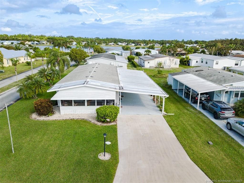 Photo of 2599 SW Marquis Terrace, Stuart, FL 34997 (MLS # M20042087)