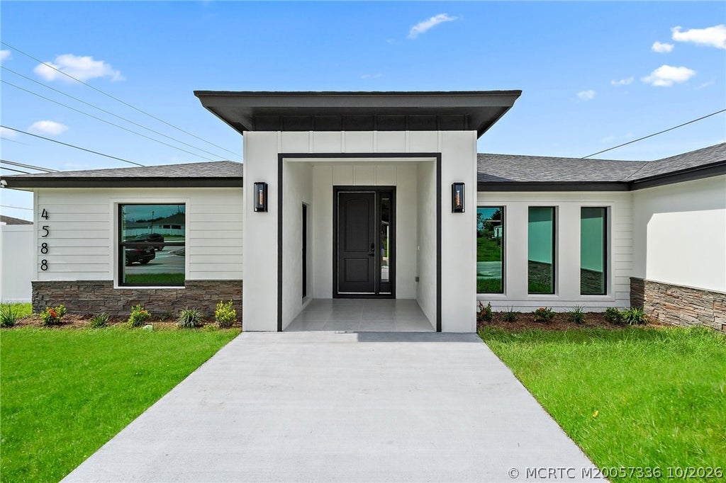 Photo of 4588 SW Athena Drive, Port Saint Lucie, FL 34953 (MLS # M20057336)
