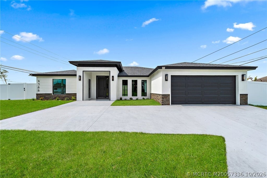 Photo of 4588 SW Athena Drive, Port Saint Lucie, FL 34953 (MLS # M20057336)