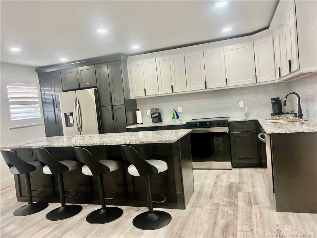 Photo of 2600 S Kanner Highway #E8, Stuart, FL 34994 (MLS # M20052542)