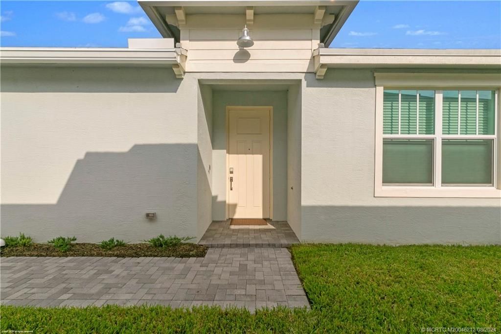 Photo of 2073 SE Crosswood Way, Port Saint Lucie, FL 34984 (MLS # M20046212)