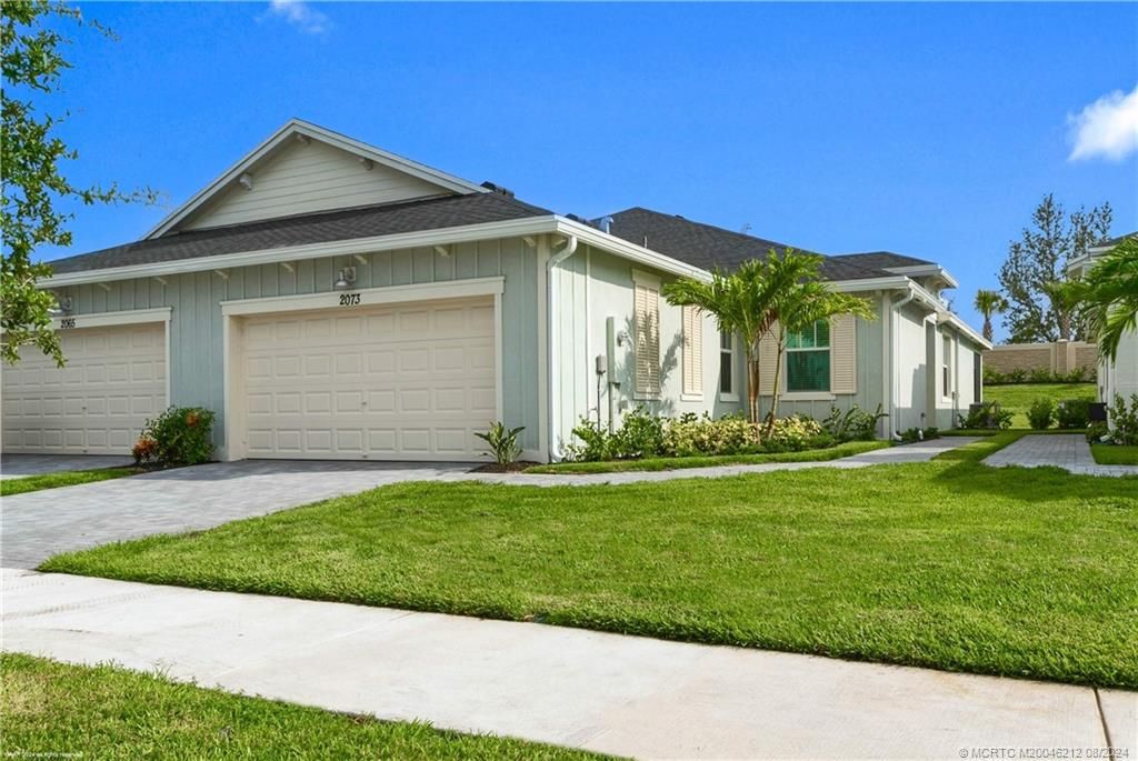 Photo of 2073 SE Crosswood Way, Port Saint Lucie, FL 34984 (MLS # M20046212)