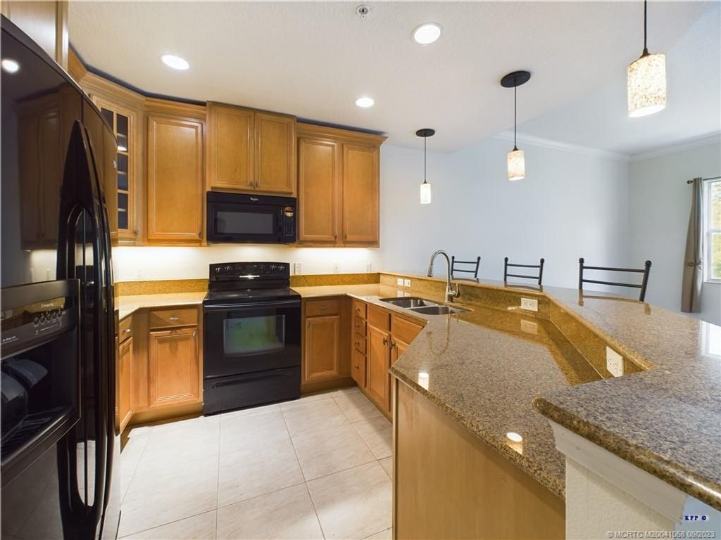 Photo of 12547 SE Old Cypress Drive, Hobe Sound, FL 33455 (MLS # M20041058)