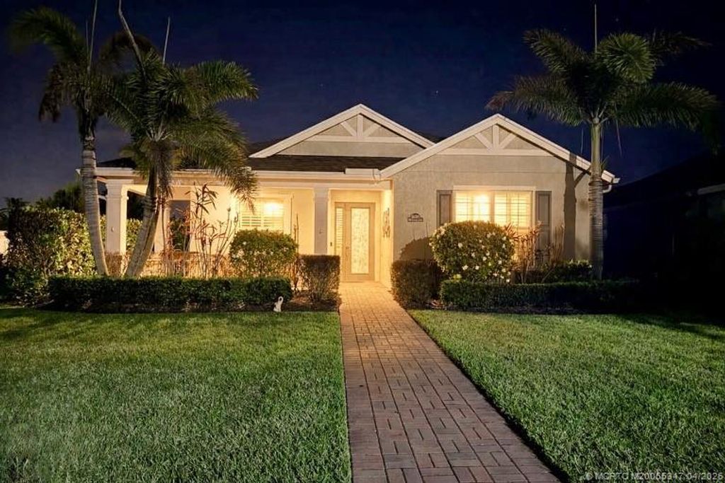 Photo of 10399 SW Landry Lane, Port Saint Lucie, FL 34987 (MLS # M20055347)