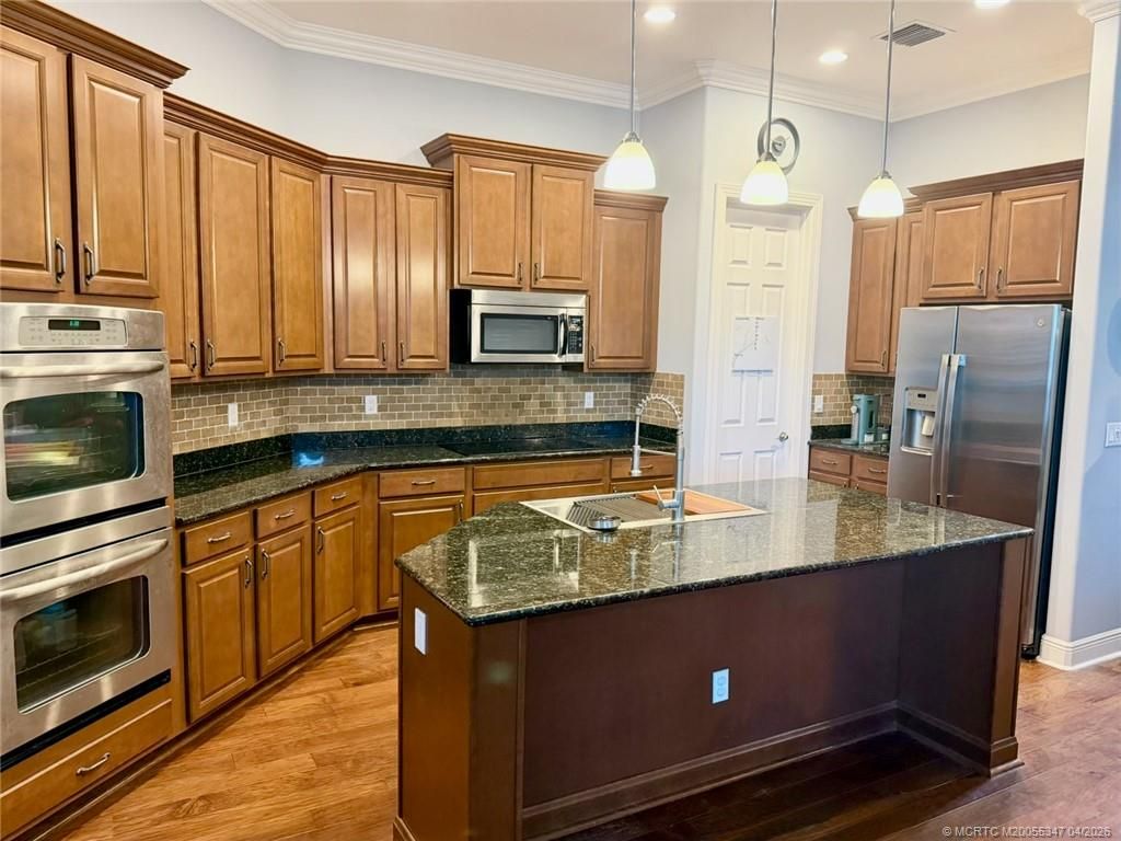 Photo of 10399 SW Landry Lane, Port Saint Lucie, FL 34987 (MLS # M20055347)