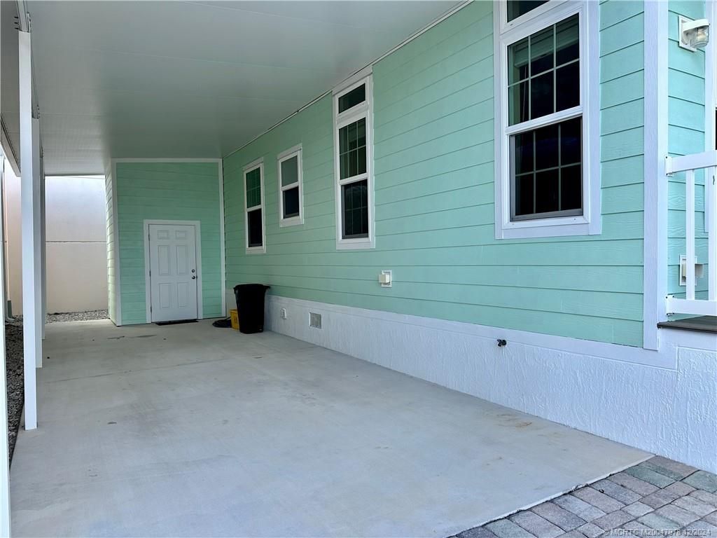 Photo of 139 NE Coastal Drive, Jensen Beach, FL 34957 (MLS # M20047978)