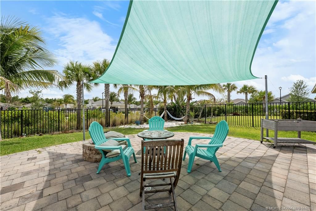 Photo of 1550 NE Skyhigh Terrace, Jensen Beach, FL 34957 (MLS # M20053879)
