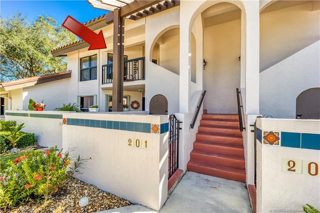 Photo of 6131 SE Martinique Drive #201, Stuart, FL 34997 (MLS # M20042445)