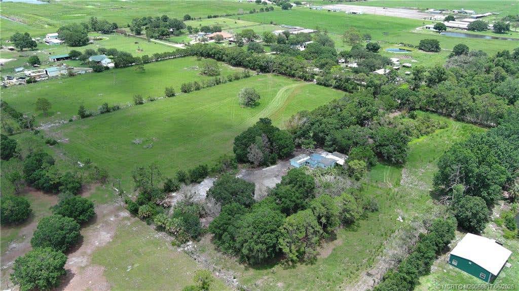Photo of 3300 SW Dunklin Avenue, Okeechobee, FL 34974 (MLS # M20055917)