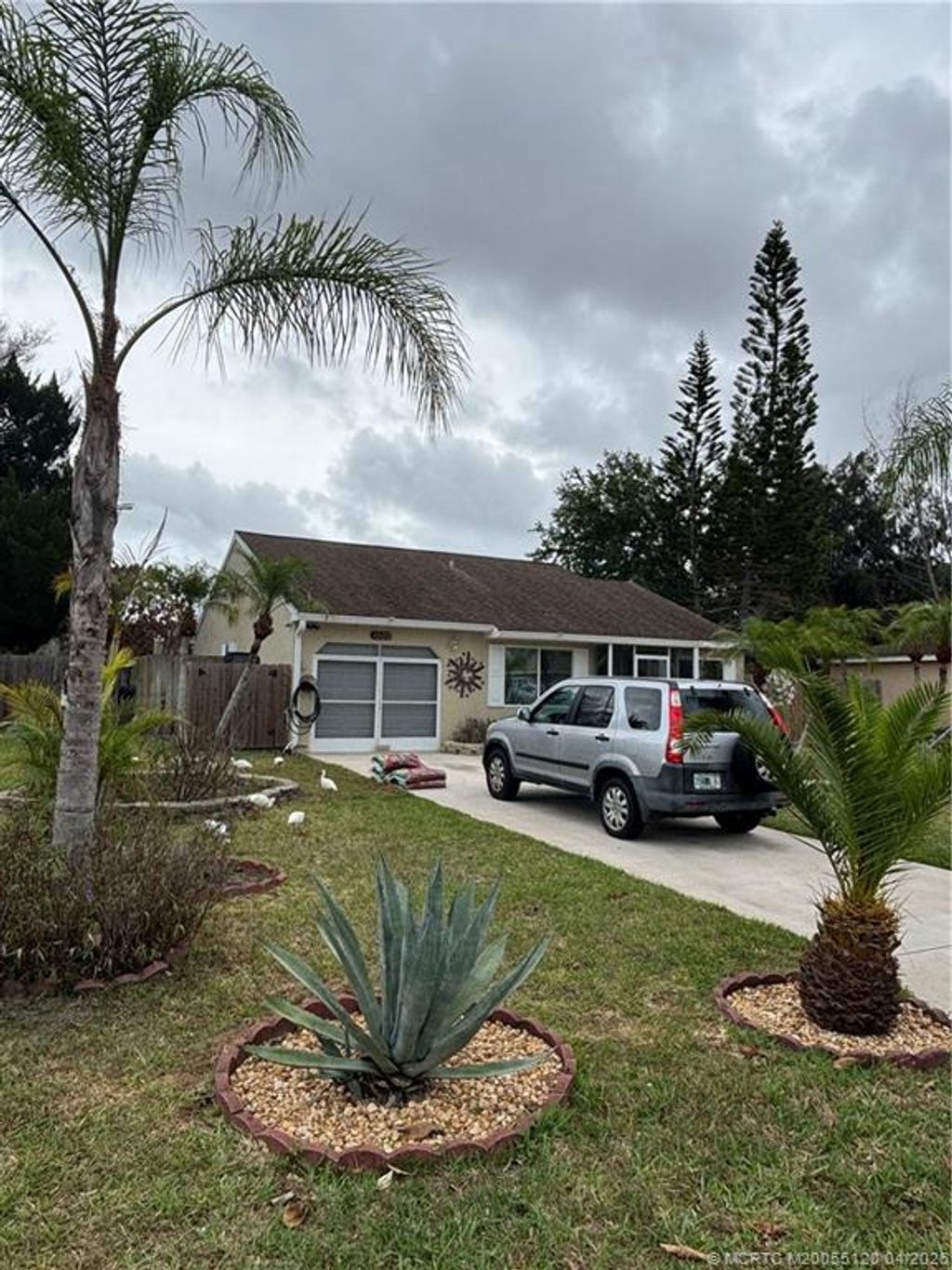 Photo of 1509 SE Belcrest Street, Port Saint Lucie, FL 34952 (MLS # M20055120)