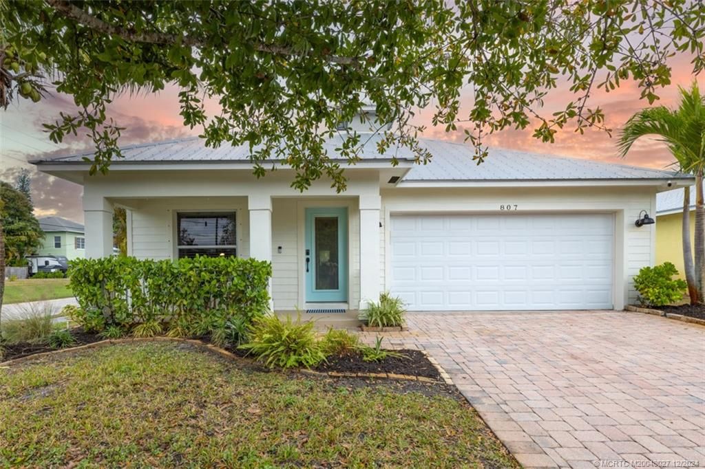 Photo of 807 SW 28th Street, Palm City, FL 34990 (MLS # M20048027)