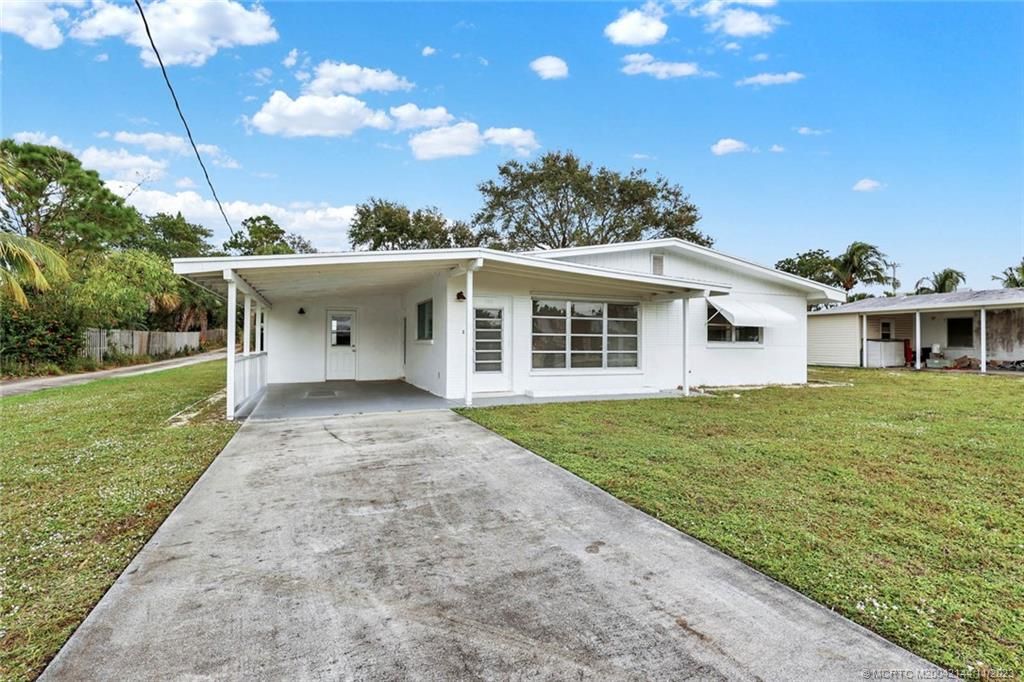 Photo of 1669 NE Sunview Terrace, Jensen Beach, FL 34957 (MLS # M20042144)