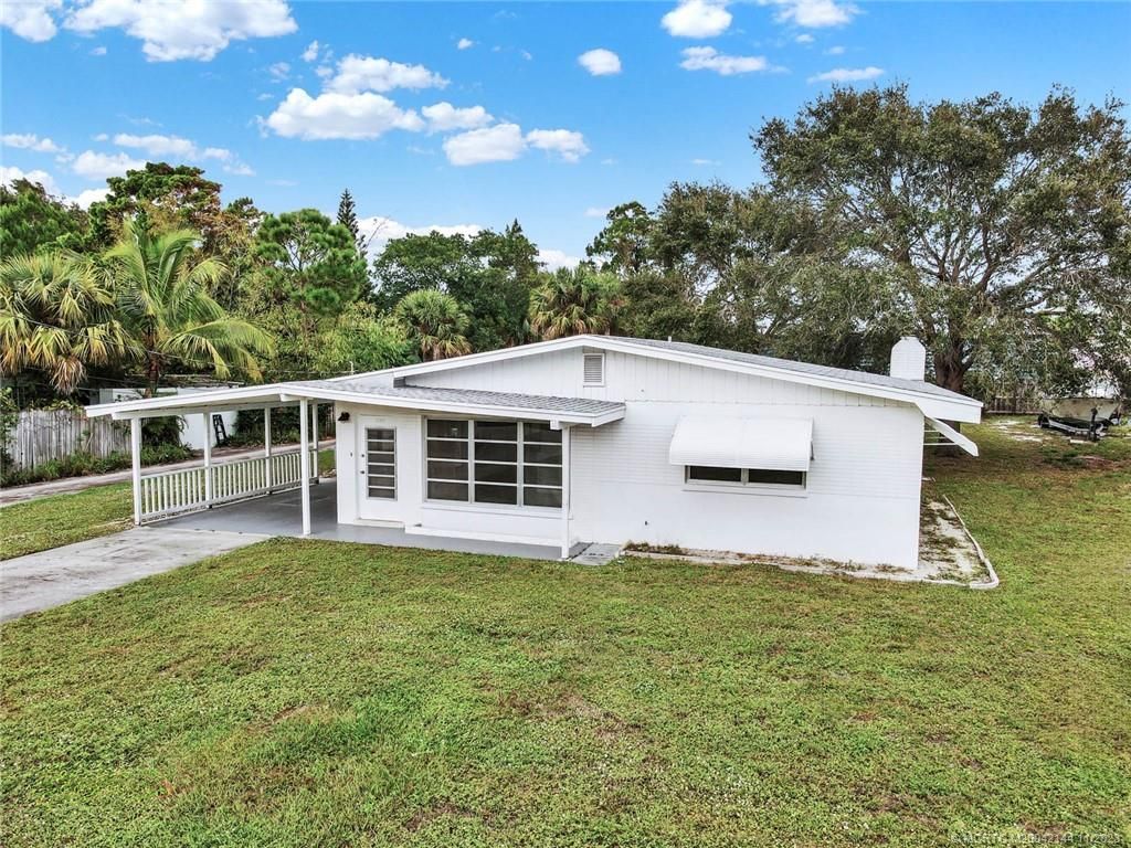 Photo of 1669 NE Sunview Terrace, Jensen Beach, FL 34957 (MLS # M20042144)