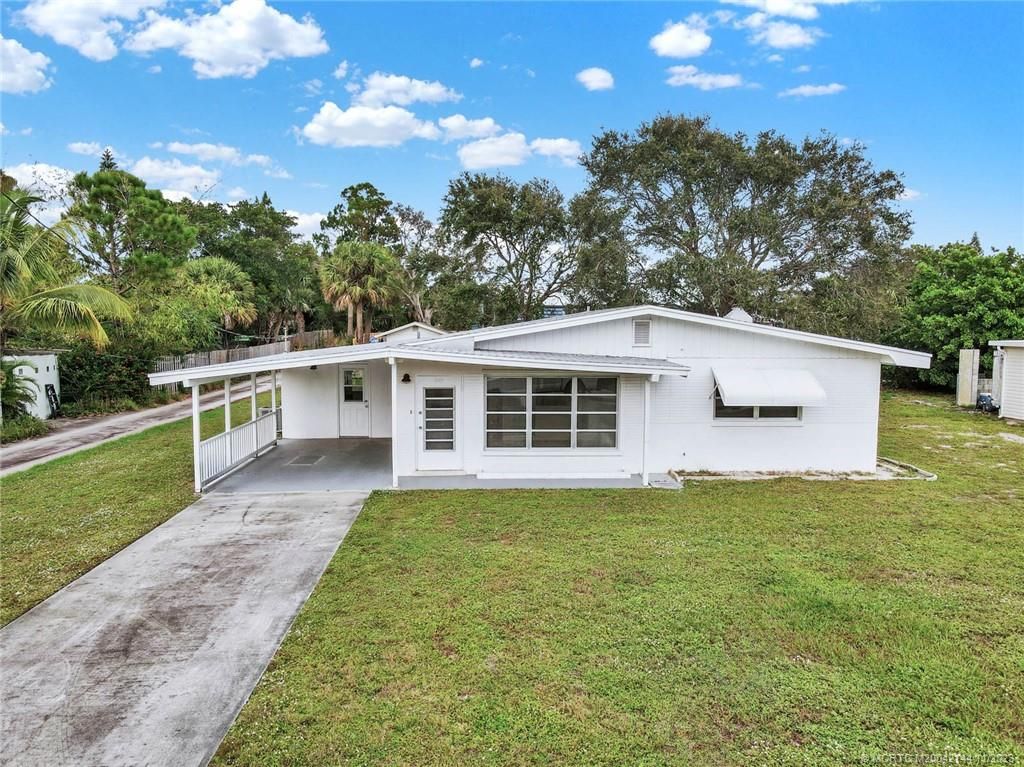 Photo of 1669 NE Sunview Terrace, Jensen Beach, FL 34957 (MLS # M20042144)