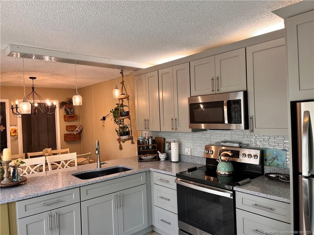 Photo of FL 34990 (MLS # M20040590)