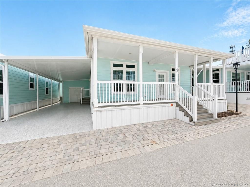 Photo of 35 NE Nautical Dr., Jensen Beach, FL 34957 (MLS # M20055413)