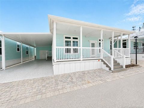 Photo of 35 NE Nautical Dr., Jensen Beach, FL 34957 (MLS # M20055413)