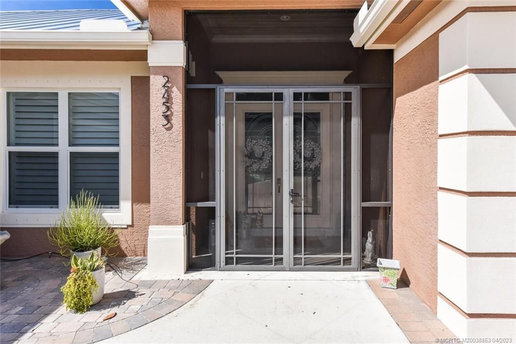 Photo of 2453 SW Hawks Gate Terrace, Palm City, FL 34990 (MLS # M20038853)