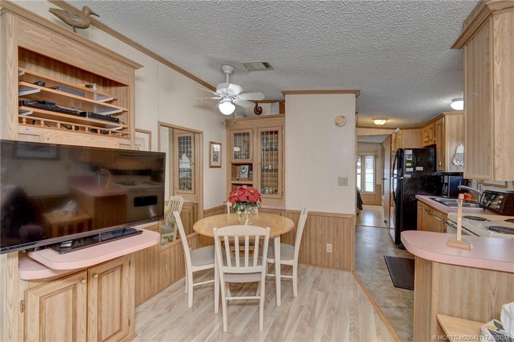 Photo of 977 Nettles Boulevard, Jensen Beach, FL 34957 (MLS # M20042117)