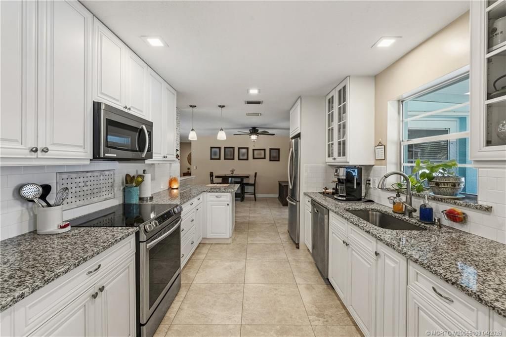 Photo of 3389 NE Linda Drive, Jensen Beach, FL 34957 (MLS # M20055109)