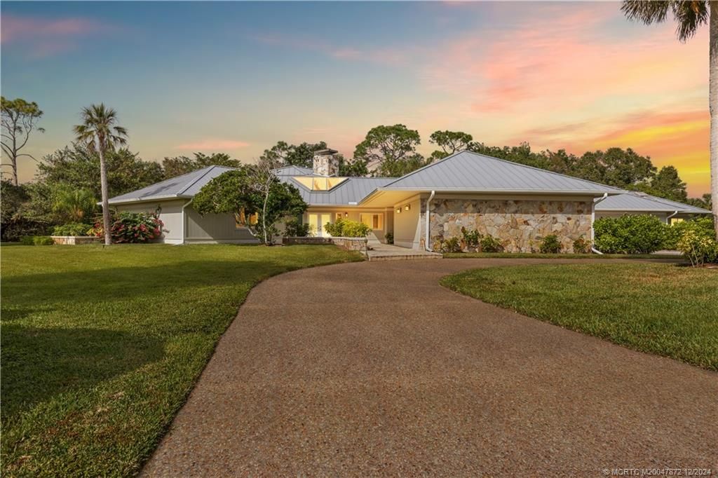 Photo of 708 SW Haddington Place, Palm City, FL 34990 (MLS # M20047872)