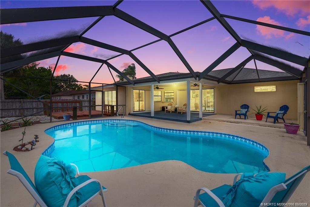 Photo of 1138 SW Gardena Avenue, Port Saint Lucie, FL 34953 (MLS # M20042092)