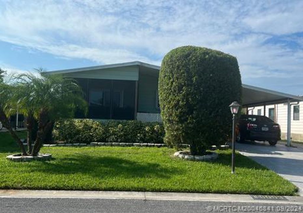 Photo of 16093 SW Indianwood Circle SW, Indiantown, FL 34956 (MLS # M20046841)